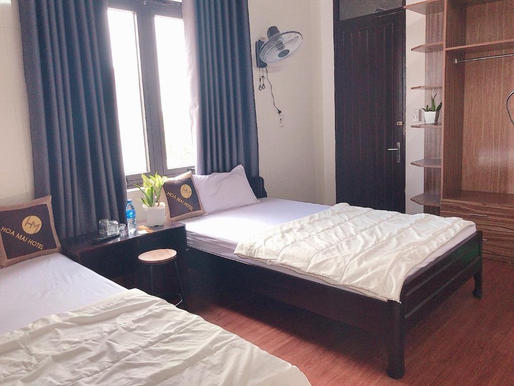 Двухместный (Двухместный номер с 2 отдельными кроватями) семейного отеля Hoa Mai Hotel, Донгхой