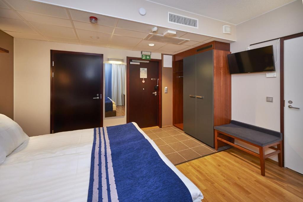 Двухместный (Стандартный двухместный номер с 1 кроватью или 2 отдельными кроватями) отеля Holiday Inn Tampere - Central Station, Тампере