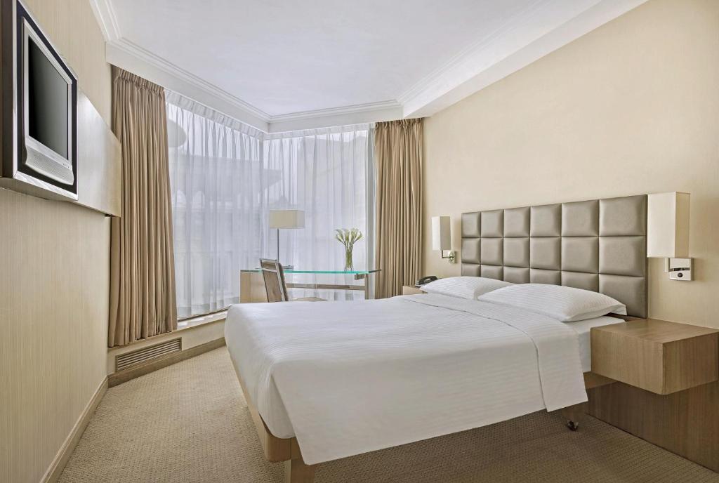 Двухместный (Номер Делюкс с 1 кроватью размера «queen-size» или 2 отдельными кроватями) отеля The Kowloon Hotel, Гонконг (город)