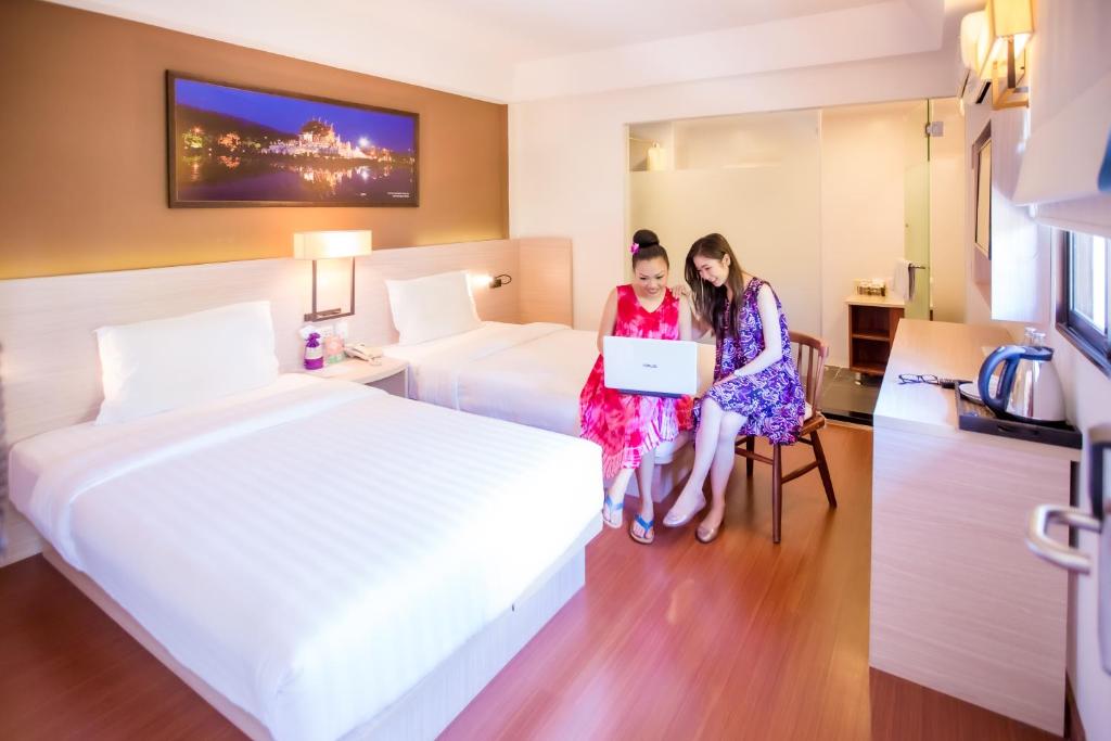 Двухместный (Стандартный двухместный номер с 2 отдельными кроватями) отеля ChiangMai 7 days Inn, Чиангмай