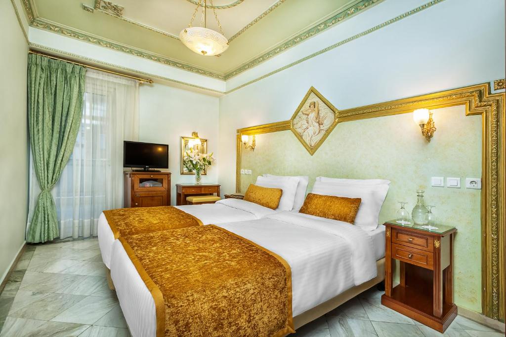Двухместный (Стандартный номер с 2 отдельными кроватями и видом на задний двор) отеля a.d. Imperial Palace, Салоники