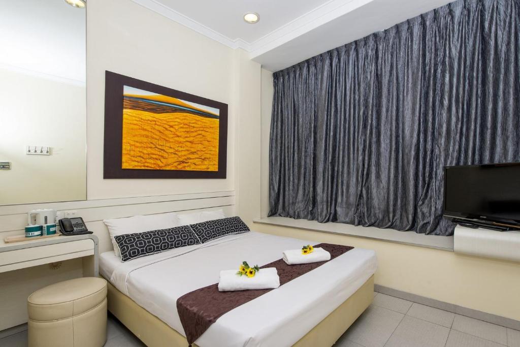 Двухместный (Улучшенный двухместный номер с 1 кроватью) отеля Hotel 81 Elegance, Сингапур (город)