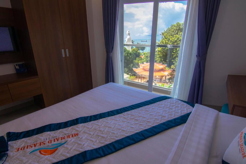 Четырехместный (Четырехместный номер с балконом) отеля Mermaid Seaside Hotel, Вунгтау