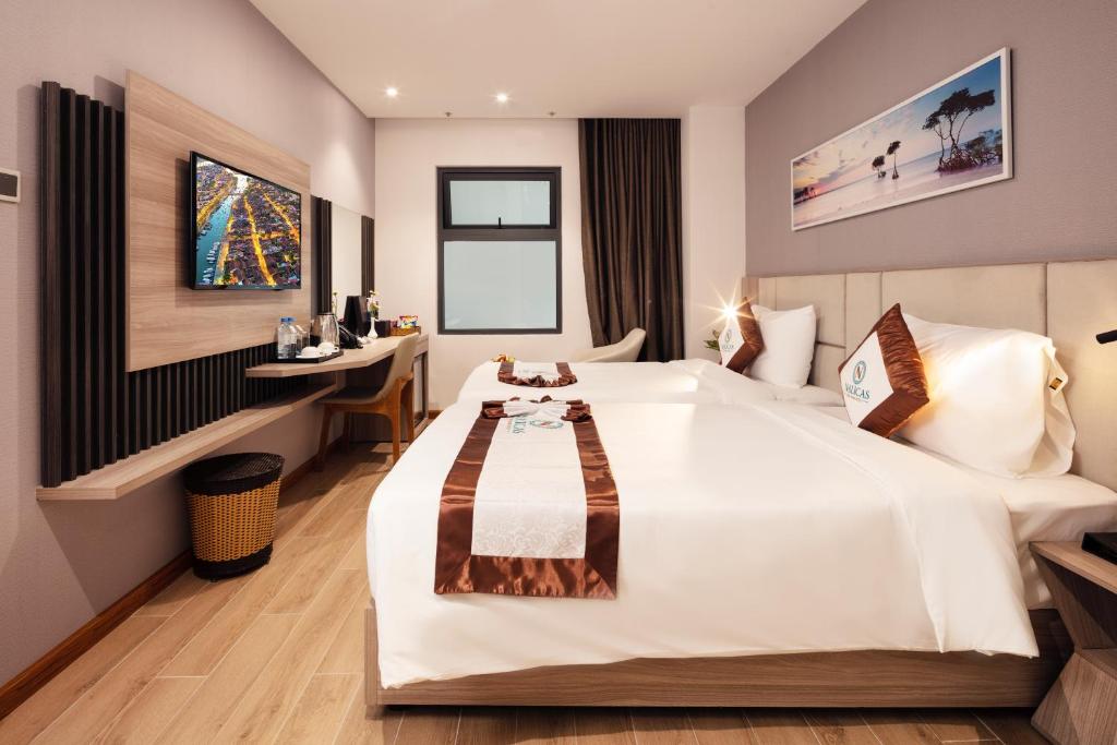 Двухместный (Улучшенный двухместный номер с 1 кроватью или 2 отдельными кроватями) отеля Nalicas Hotel, Нячанг
