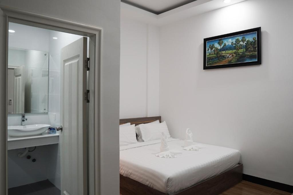 Двухместный (Стандартный номер с кроватью размера «king-size» - Без окна) отеля Apple Hotel Three, Пномпень