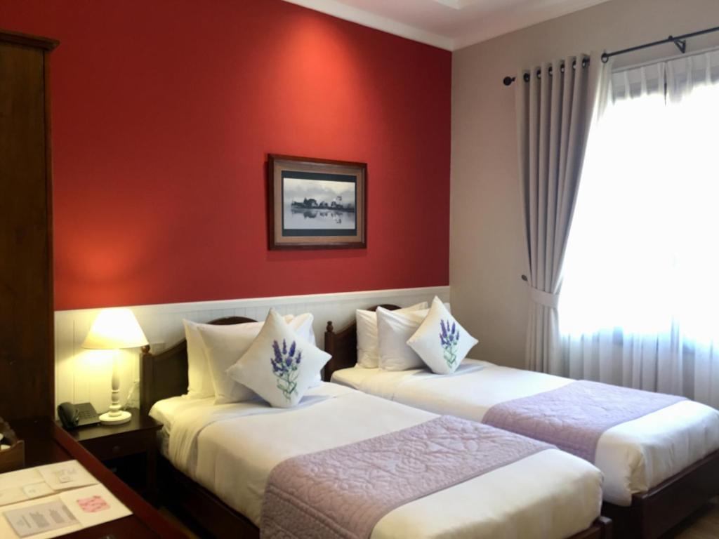 Двухместный (Стандартный двухместный номер с 2 отдельными кроватями) гостевого дома Bich Dao Boutique Hotel, Далат