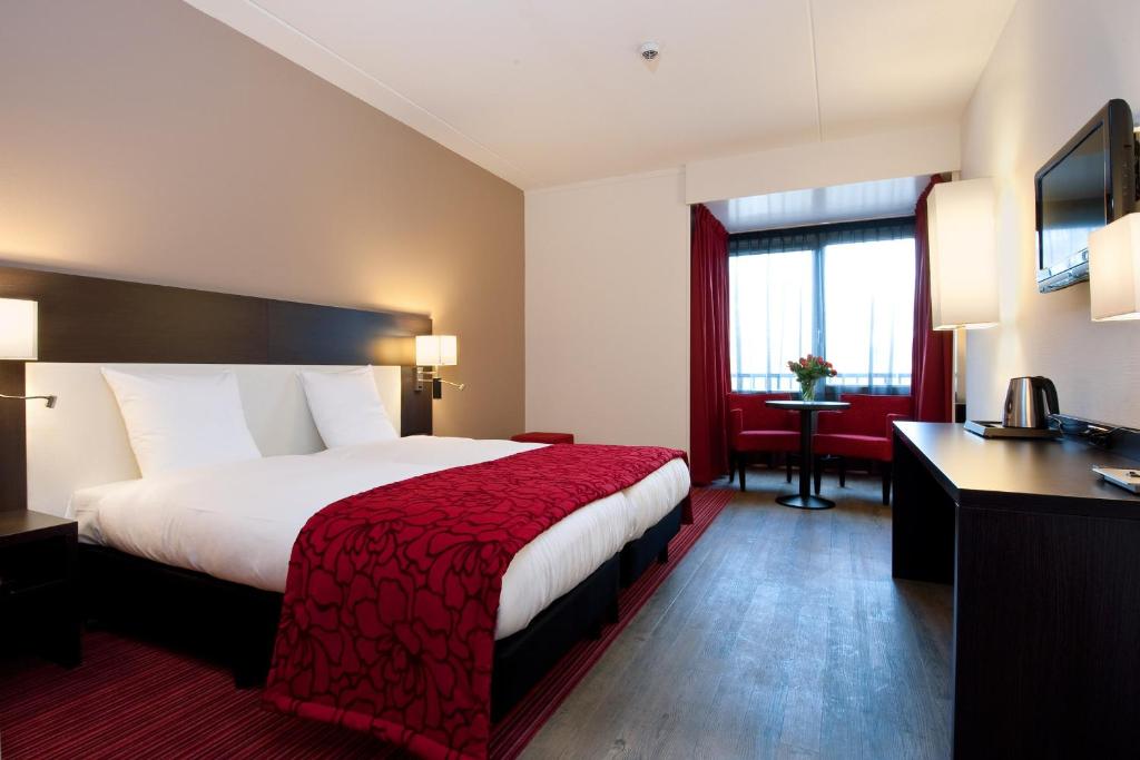 Двухместный (Стандартный двухместный номер с 1 кроватью или 2 отдельными кроватями) отеля Grenshotel de Jonckheer, Берген-оп-Зом