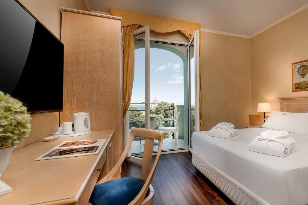 Двухместный (Представительский двухместный номер с 1 кроватью, вид на море и доступом в спа-салон) отеля Hotel De Londres, Римини