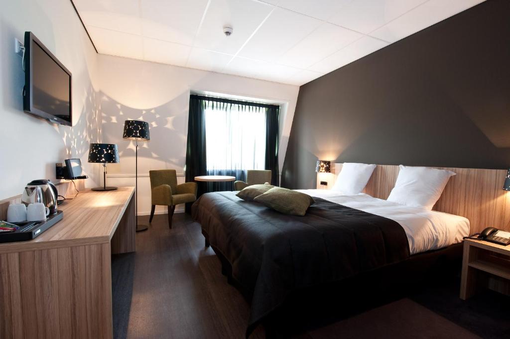Двухместный (Двухместный номер Делюкс с 1 кроватью) отеля Grenshotel de Jonckheer, Берген-оп-Зом
