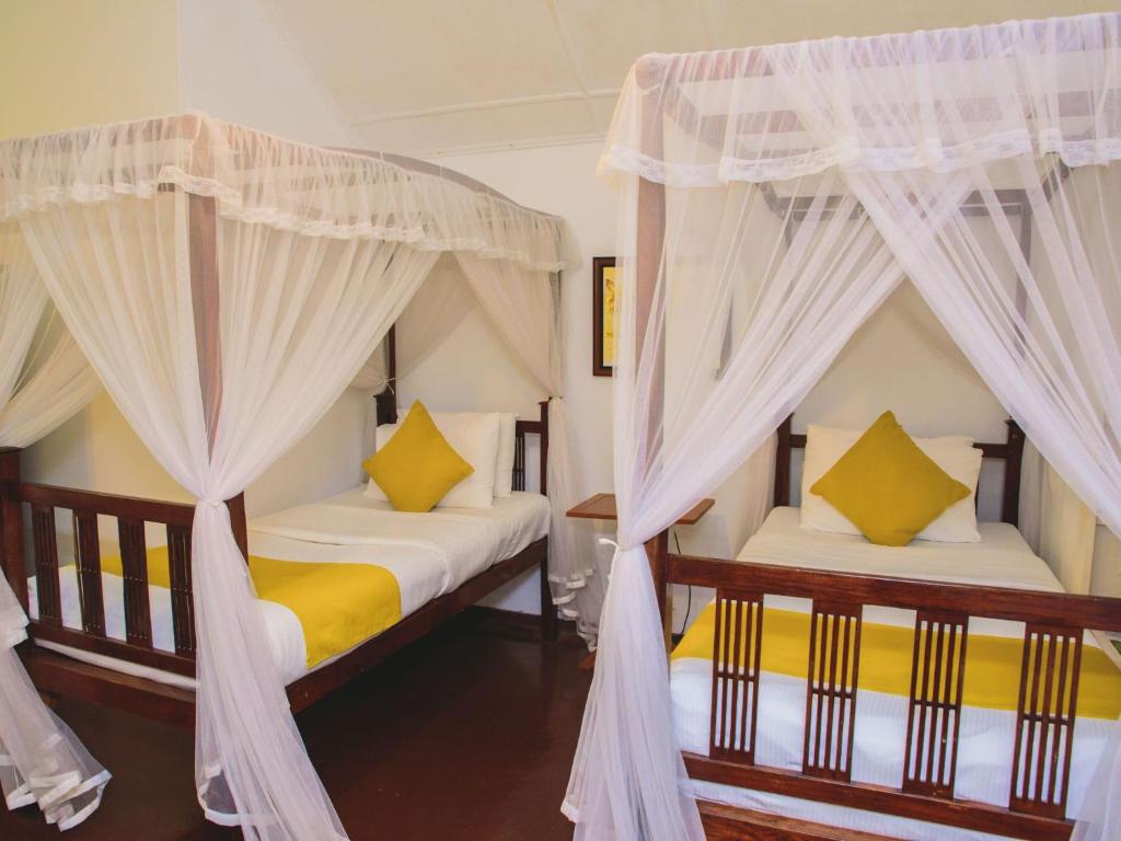 Двухместный (Двухместный номер Делюкс с 2 отдельными кроватями) отеля Thalpe Walawwa Heritage Villa, Унаватуна