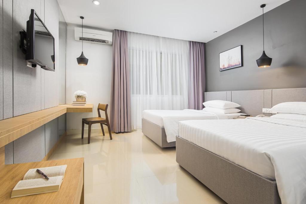 Двухместный (Улучшенный двухместный номер с 2 отдельными кроватями) отеля Altos Hotel, Пномпень