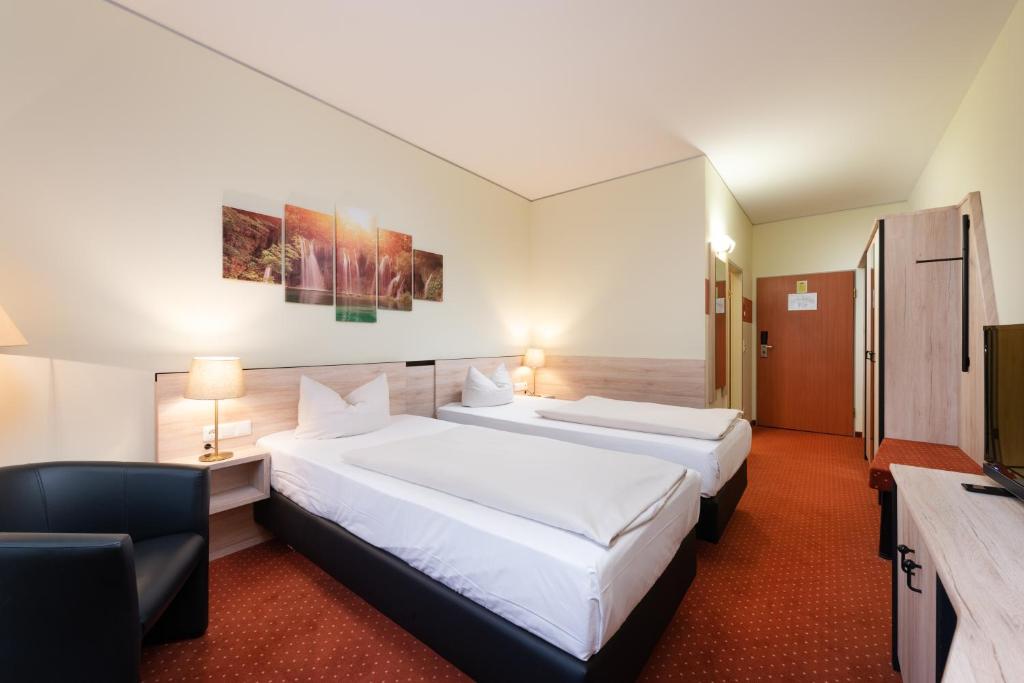 Двухместный (Двухместный номер «Комфорт» с 2 отдельными кроватями) отеля NOVINA HOTEL Südwestpark, Нюрнберг