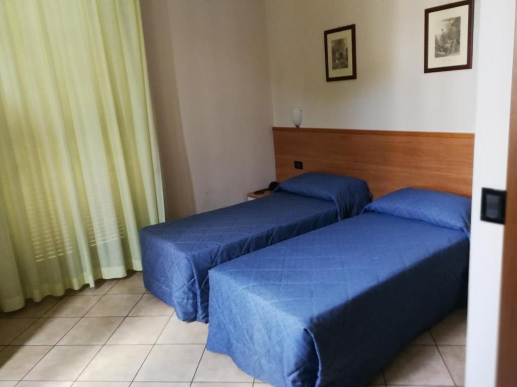 Двухместный (Двухместный номер с 2 отдельными кроватями) отеля Albergo Salerno, Милан
