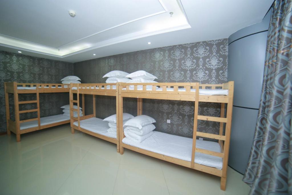 Номер (Кровать в общем 6-местном номере для мужчин и женщин) загородного отеля Country Utopian Inn, Чунцин