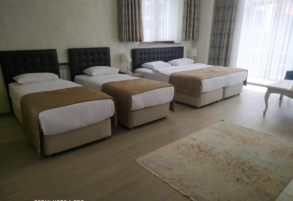 Четырехместный (Стандартный четырехместный номер) отеля Аммар, Баку
