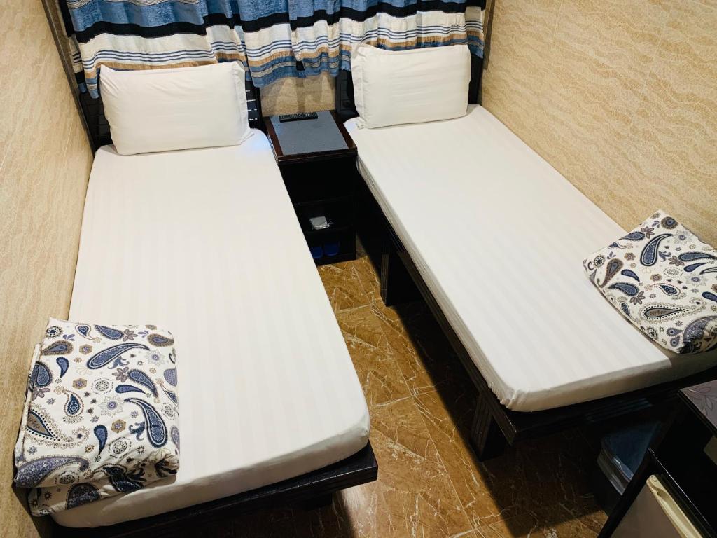Двухместный (Двухместный номер с 2 отдельными кроватями) гостевого дома Sleep In Hotel, Гонконг (город)