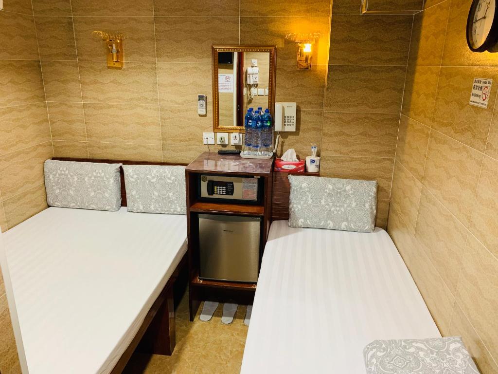 Трехместный (Трехместный номер) гостевого дома Sleep In Hotel, Гонконг (город)