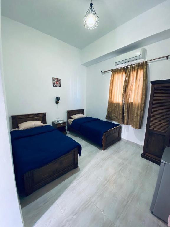 Двухместный (Стандартный двухместный номер с 1 кроватью или 2 отдельными кроватями) отеля Golden Plaza Dahab Resort, Дахаб