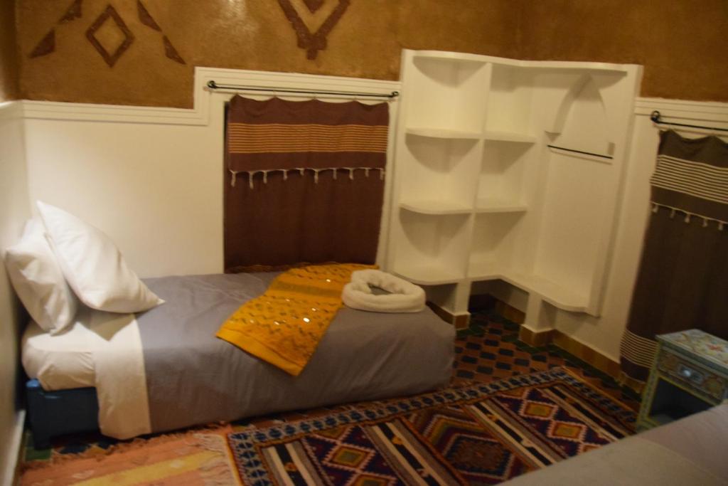 Трехместный (Стандартный трехместный номер) отеля Kasbah Assafar, Бумальн
