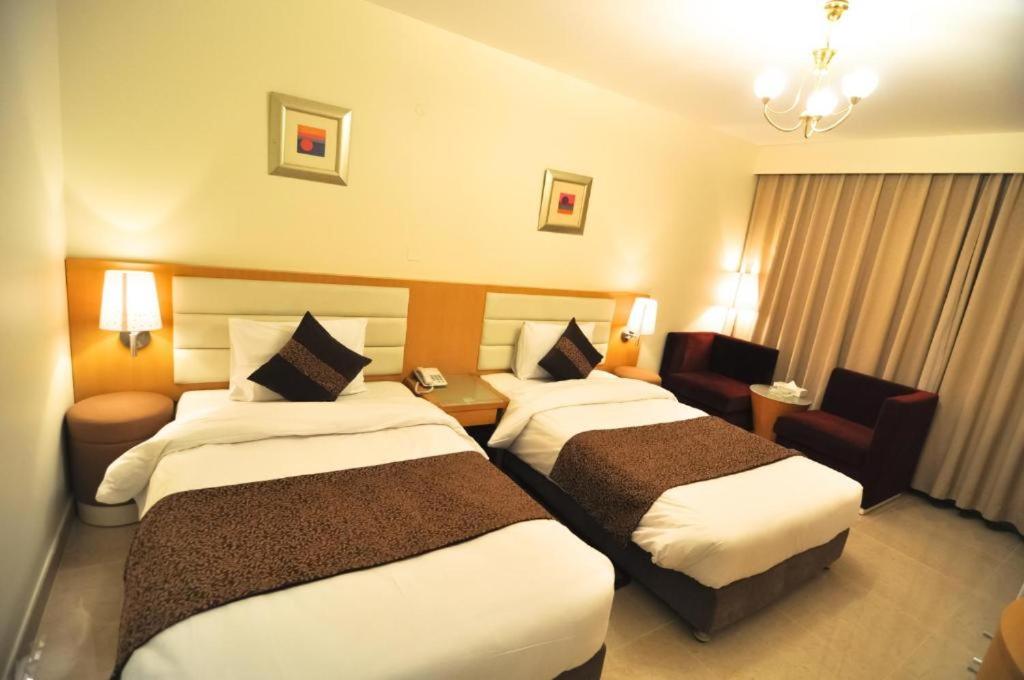 Двухместный (Двухместный номер Делюкс с 1 кроватью или 2 отдельными кроватями) отеля Phoenicia Hotel, Дубай