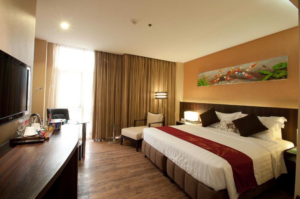 Двухместный (Двухместный номер Делюкс с 1 кроватью или 2 отдельными кроватями) отеля Ramada by Wyndham Manila Central, Манила