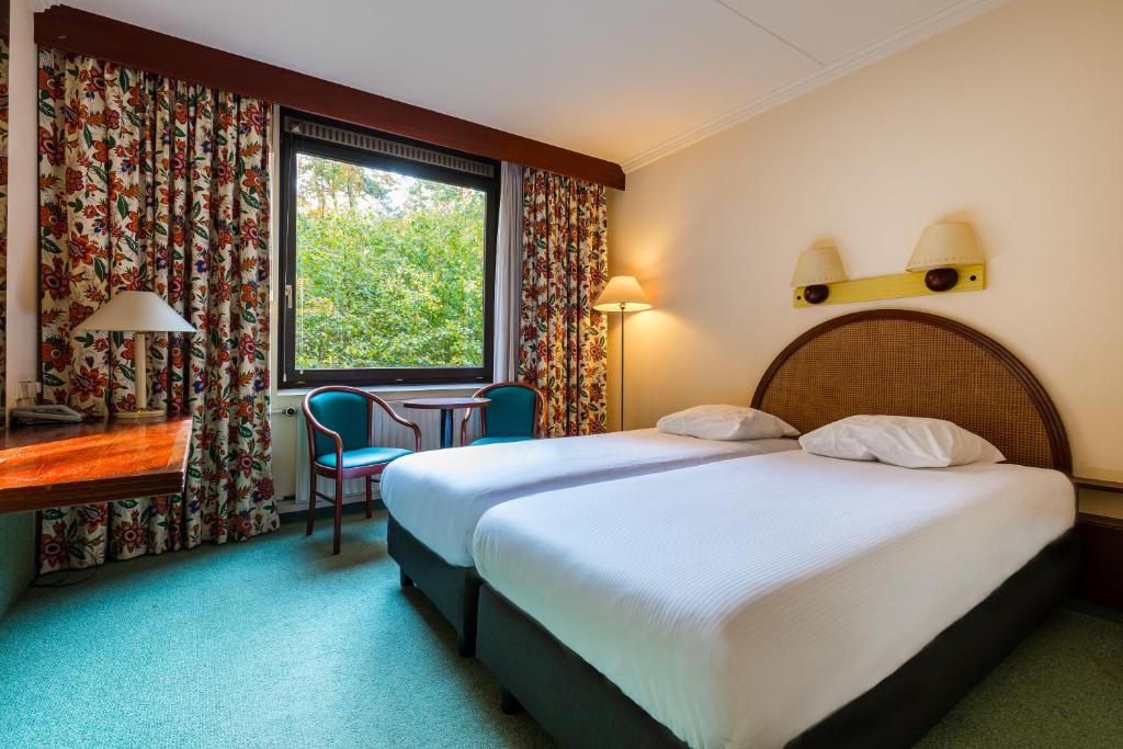 Двухместный (Стандартный двухместный номер с 2 отдельными кроватями) отеля Postillion Hotel Arnhem, Арнем
