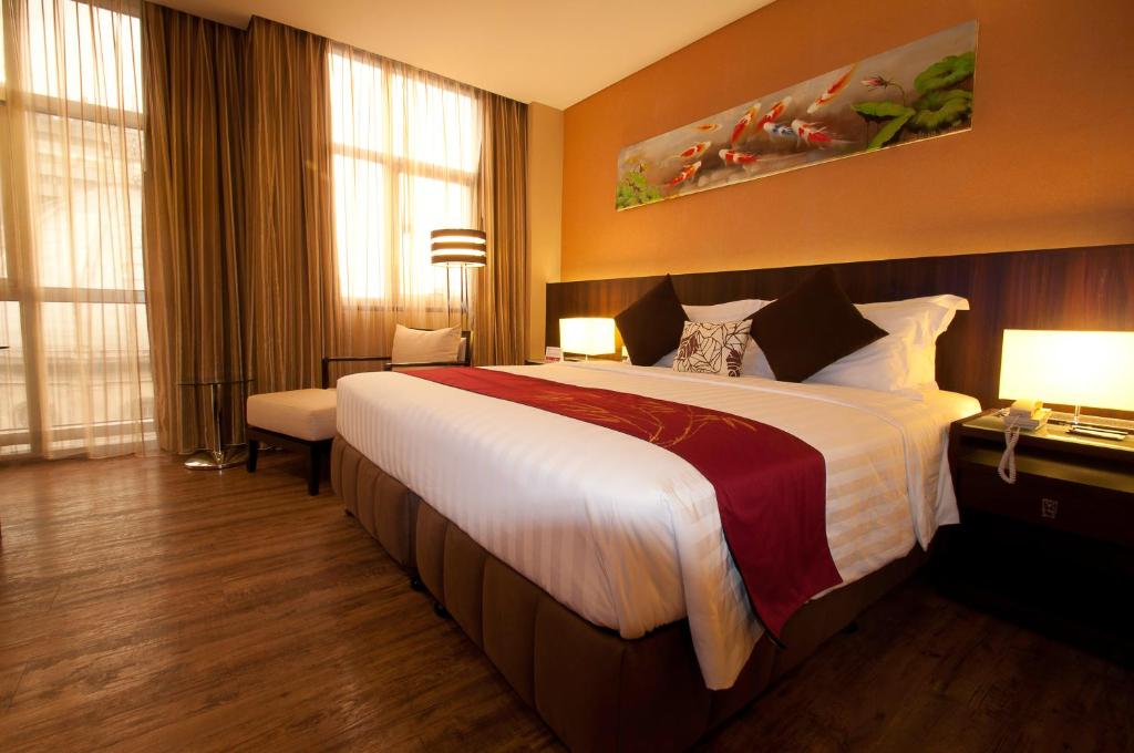 Двухместный (Представительский двухместный номер с 1 кроватью или 2 отдельными кроватями) отеля Ramada by Wyndham Manila Central, Манила