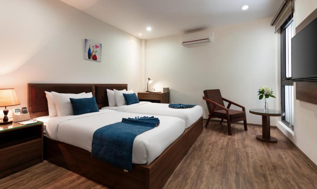 Двухместный (Классический двухместный номер с 2 отдельными кроватями) отеля La Batisse Kim Ma Hotel, Ханой