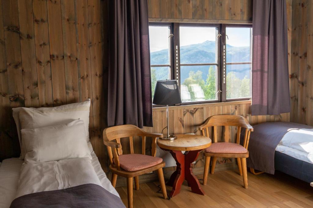 Двухместный (Двухместный номер с 2 отдельными кроватями) курортного отеля Rondane Høyfjellshotell, Винстра