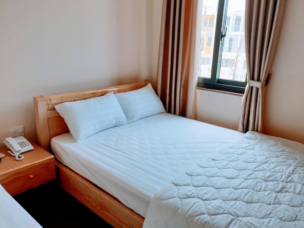 Четырехместный (Стандартный номер с двумя кроватями размера «queen-size») гостевого дома Hotel Mỹ Phương, Ратьзя