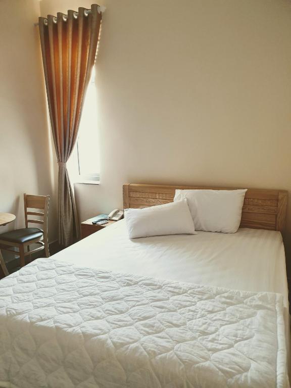 Двухместный (Большой двухместный номер с 1 кроватью) гостевого дома Hotel Mỹ Phương, Ратьзя