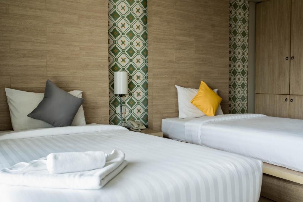 Двухместный (Двухместный номер Делюкс с 2 отдельными кроватями) отеля Chinotel, Пхукет