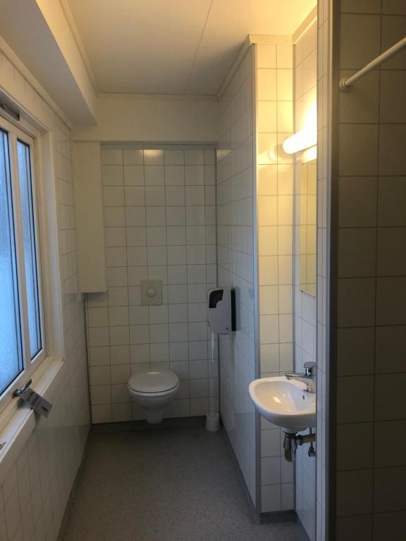 Четырехместный (Четырехместный номер с ванной комнатой) хостела Gjøvik Hovdetun Hostel, Йёвик