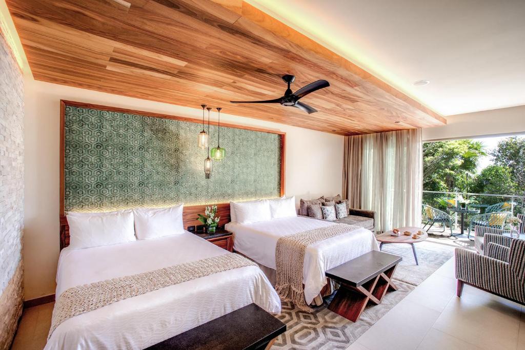 Одноместный (Люкс Individual с кроватью размера «queen-size» и видом на океан) курортного отеля Sandos Palm Bay Playacar, Плая-дель-Кармен