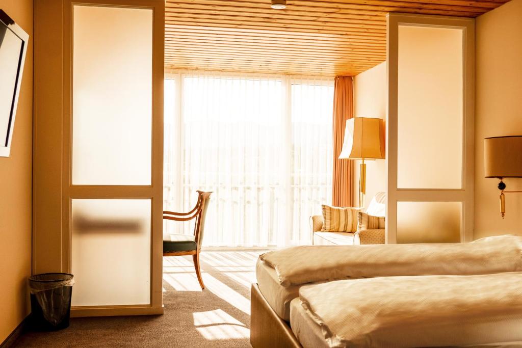 Двухместный (Улучшенный двухместный номер с 1 кроватью) отеля Swisshotel Flims, Флимс
