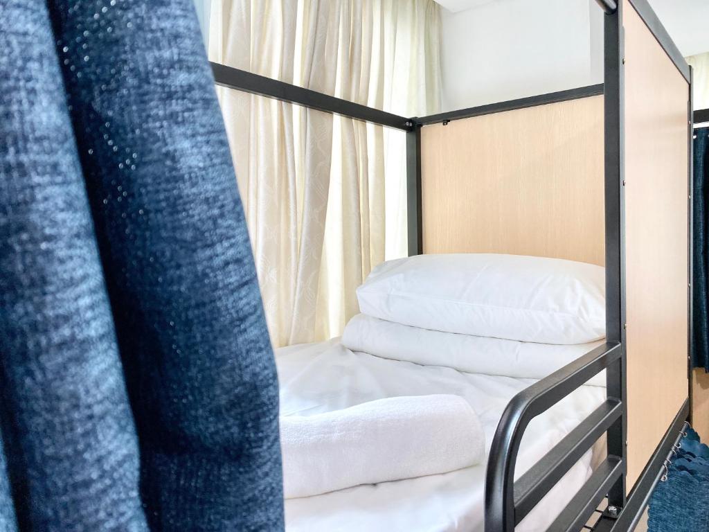 Номер (Bed in 10-Bed Mixed Dormitory Room (Netflix + 100Mbps)), Summer Suites KLCC Apartments