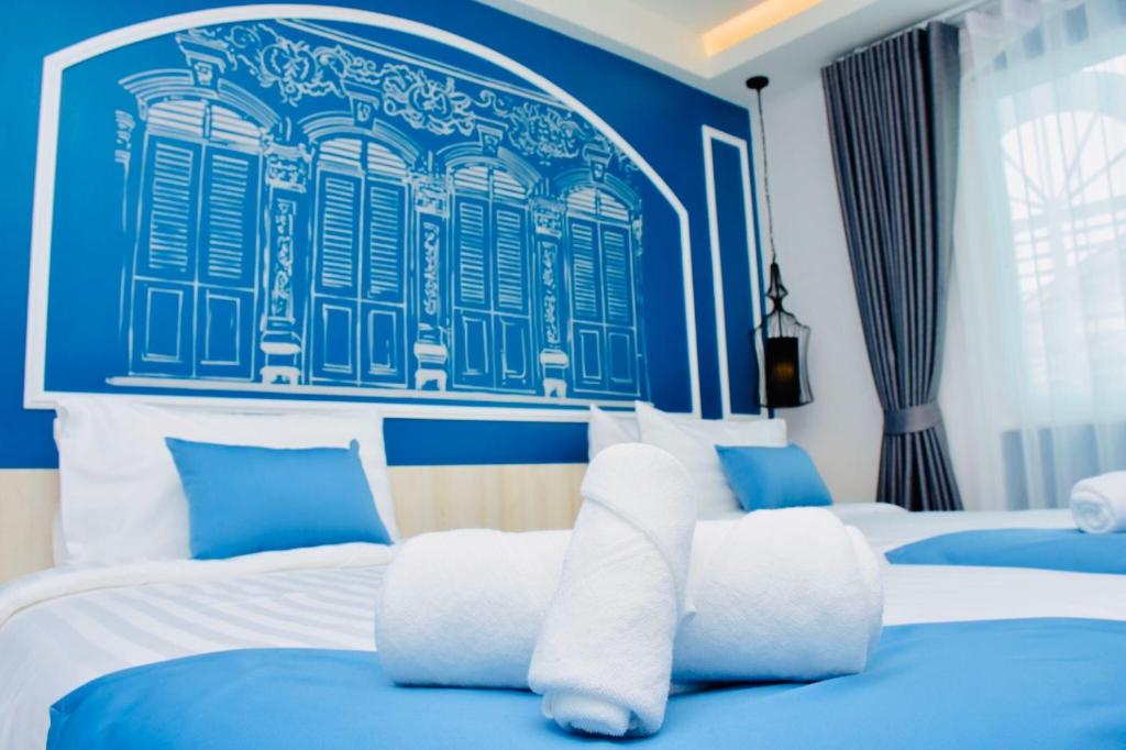 Двухместный (Двухместный номер Делюкс с 2 отдельными кроватями) отеля Peranakan House, Пхукет