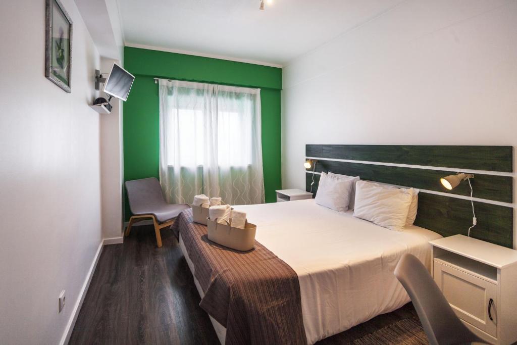 Двухместный (Двухместный номер с 1 кроватью или 2 отдельными кроватями, общая ванная комната) гостевого дома Atlantic Home Azores, Понта-Делгада