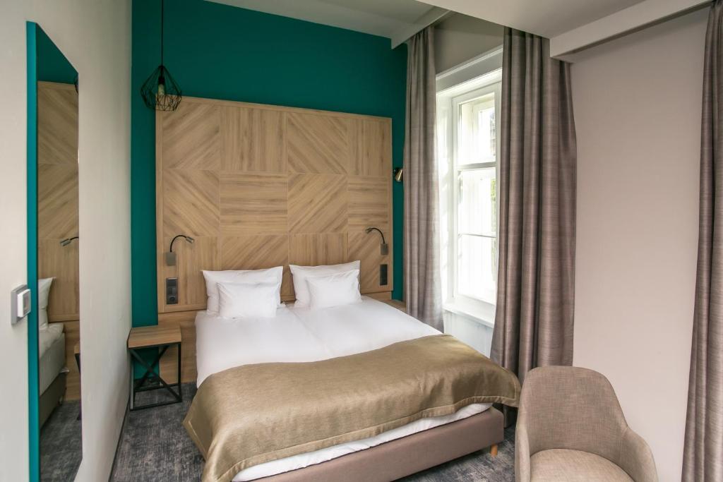 Двухместный (Улучшенный двухместный номер с 1 кроватью или 2 отдельными кроватями) отеля T62 Hotel, Будапешт