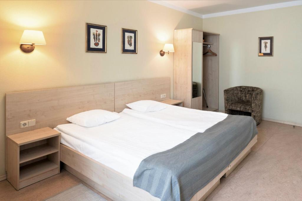 Двухместный (Улучшенный двухместный номер с 1 кроватью или 2 отдельными кроватями) отеля Rixwell Domus Hotel, Рига
