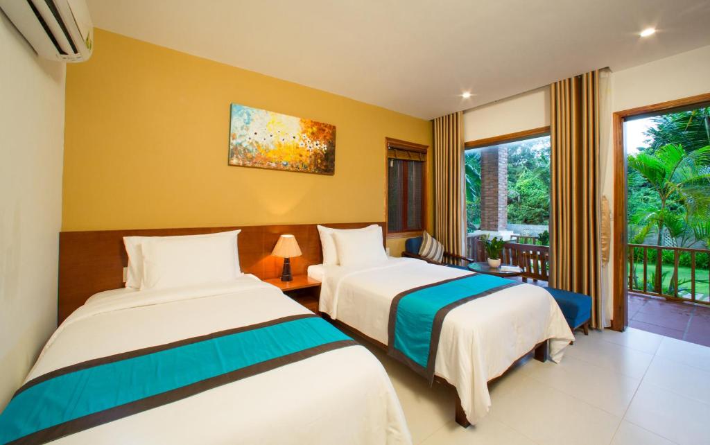 Двухместный (Улучшенный двухместный номер с 1 кроватью или 2 отдельными кроватями и видом на сад) курортного отеля Nadine Phu Quoc Resort & Spa, Дуонг-Донг