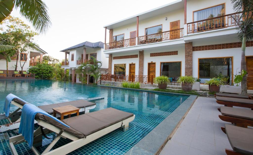 Сьюит (Семейный люкс с 2 спальнями, вид на бассейн) курортного отеля Nadine Phu Quoc Resort & Spa, Дуонг-Донг