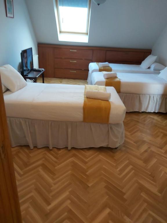 Двухместный (Двухместный номер с 2 отдельными кроватями и общим туалетом) гостевого дома Avila Rooms, Мадрид