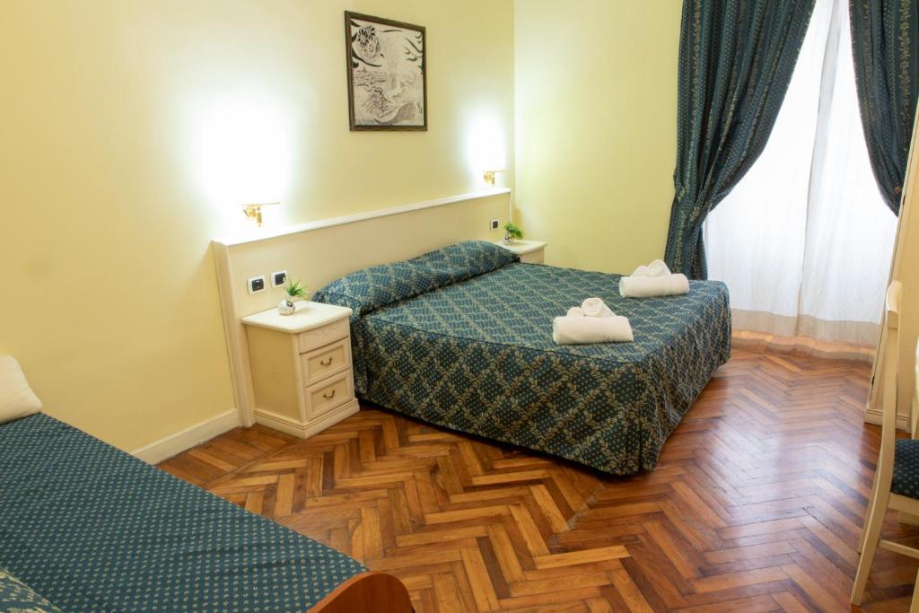 Двухместный (Двухместный номер с 1 кроватью и собственной ванной комнатой вне номера) отеля Annette B&B, Рим