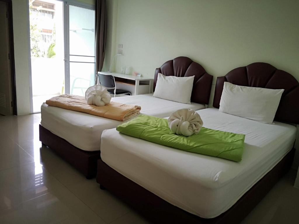 Двухместный (Стандартный двухместный номер с 2 отдельными кроватями) отеля Papangkorn House, Сураттхани