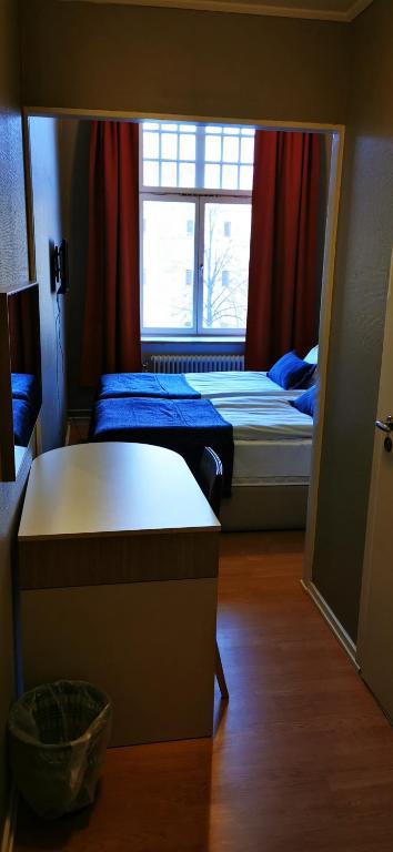 Двухместный (Двухместный номер эконом-класса с 1 кроватью или 2 отдельными кроватями) отеля Sundsvall City Hotel & Hostel, Сундсвалль