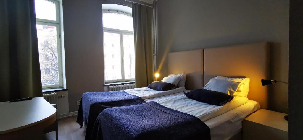 Двухместный (Стандартный двухместный номер с 1 кроватью или 2 отдельными кроватями) отеля Sundsvall City Hotel & Hostel, Сундсвалль
