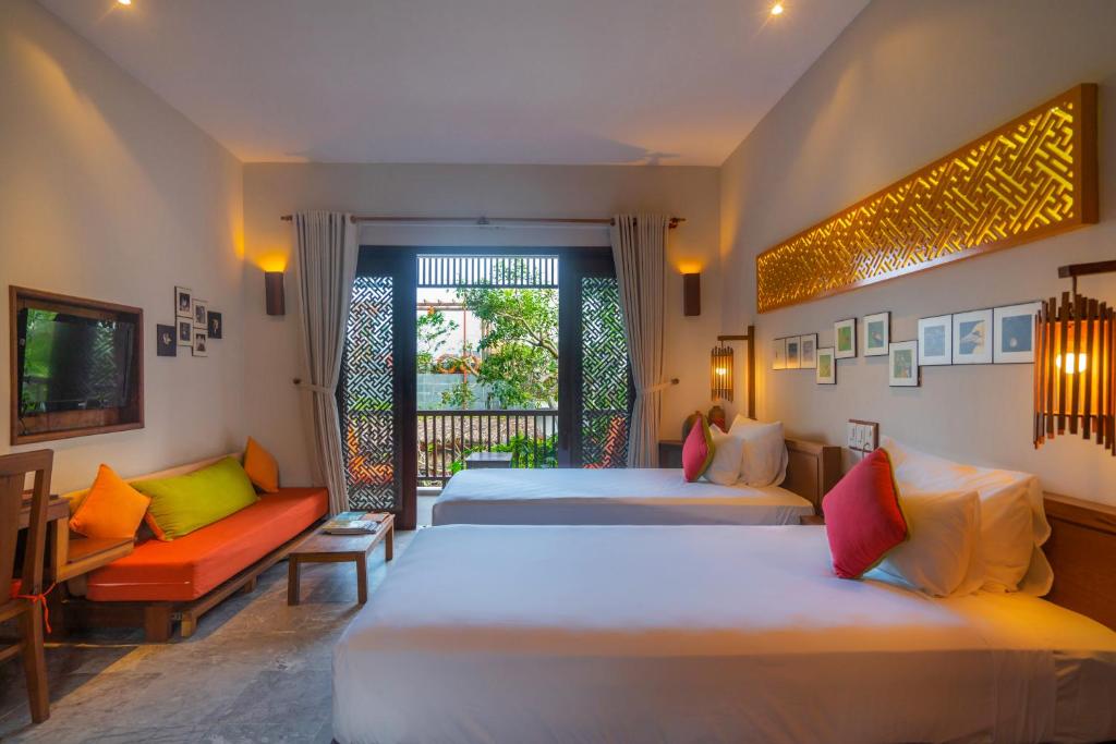 Двухместный (Двухместный люкс с 1 кроватью или 2 отдельными кроватями) отеля Hoi An Chic, Хойан