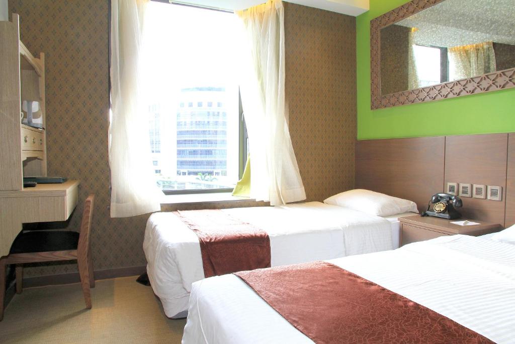 Двухместный (Стандартный двухместный номер с 2 отдельными кроватями) отеля Largos Hotel, Гонконг (город)