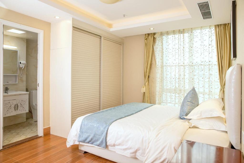 Апартаменты (Улучшенные апартаменты с 3 спальнями), Guangzhou Pengman Apartment Zhengjia Huanshi Branch